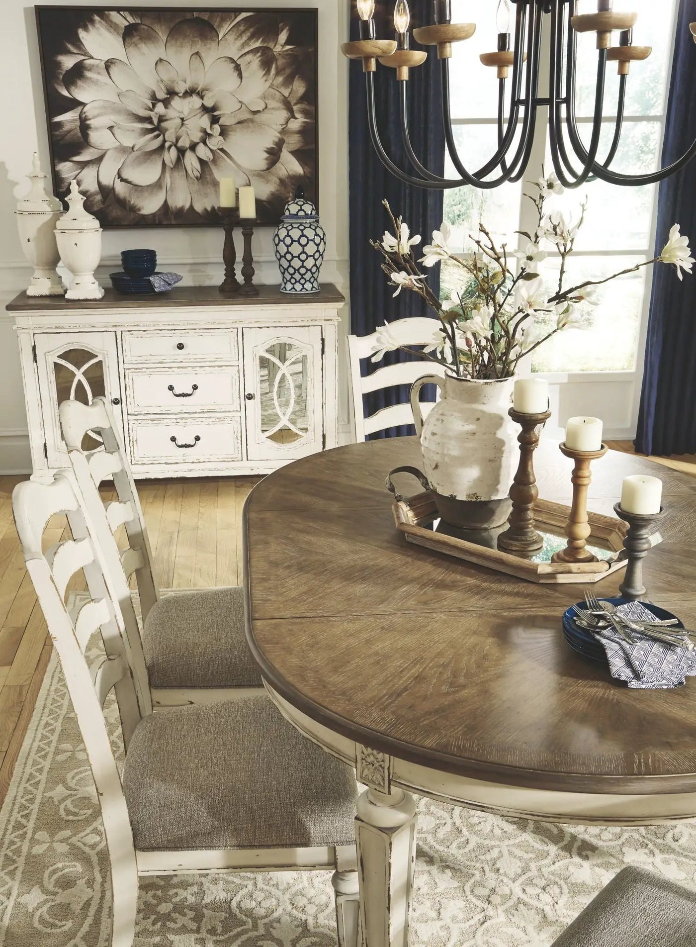 Realyn - Oval Dining Table Set by Unique Piece Furniture