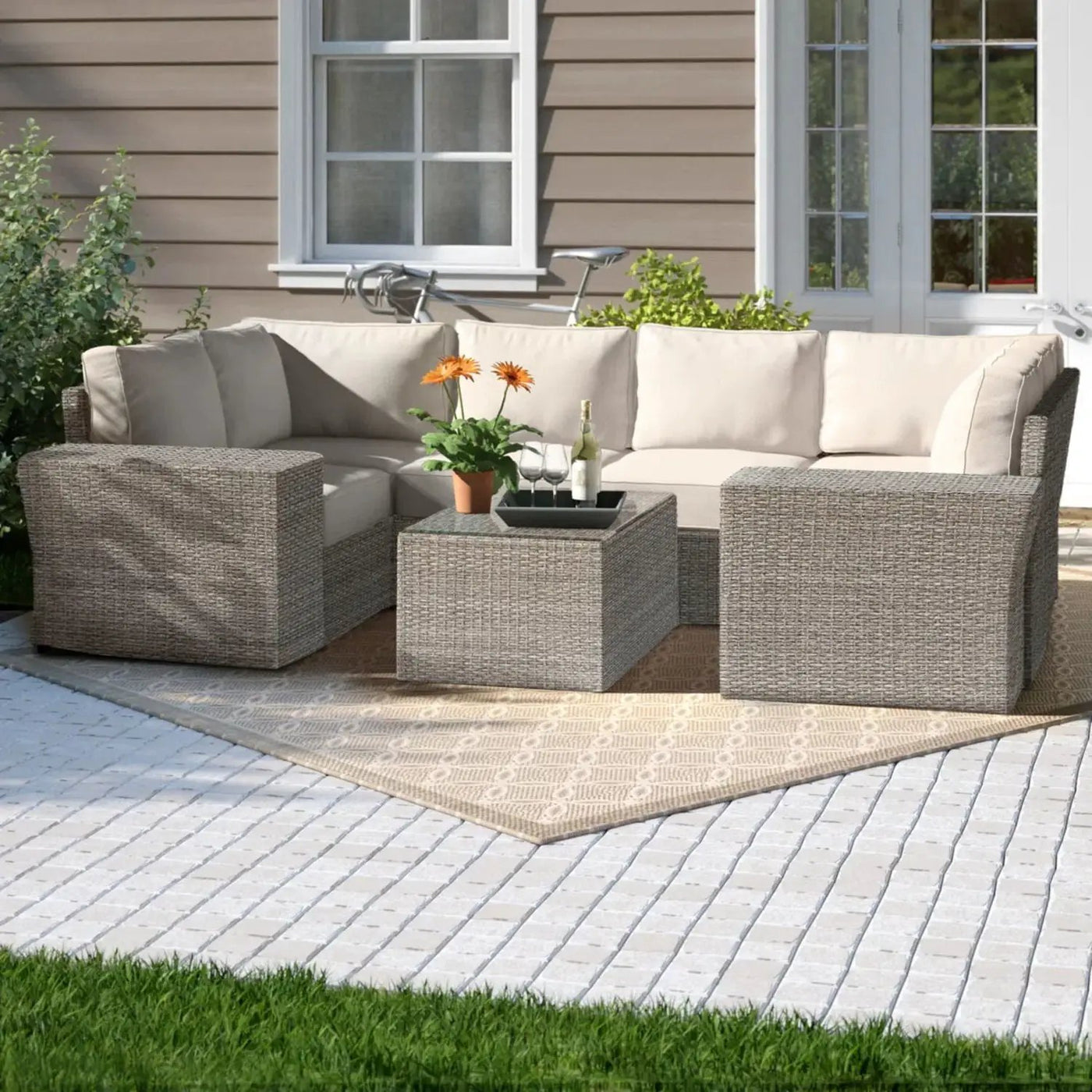 Outdoor Wicker Sectional With Weather Resistant Cushions And Table by Unique Piece Furniture