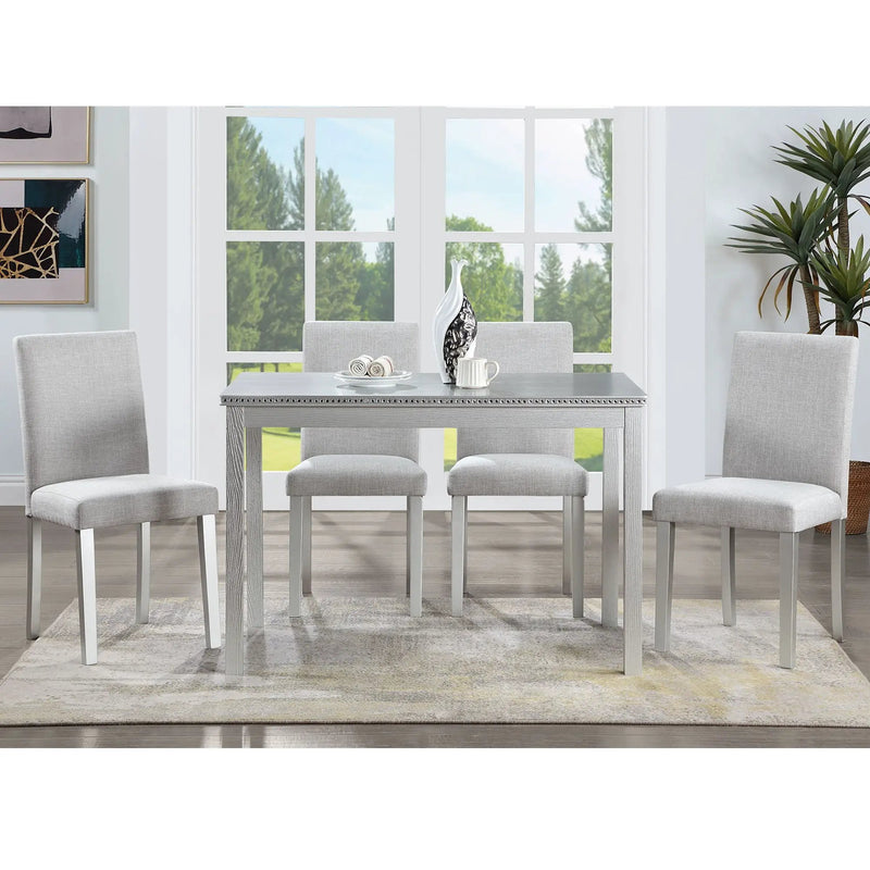 Dining Table Set With Crystal Decoration And Upholstered Chairs by Unique Piece Furniture