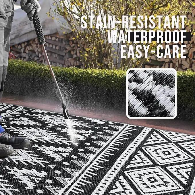OLANLY Outdoor Rug Waterproof 10x14 ft, Reversible Outdoor Plastic Straw Rug, Boho Patio Rug, Indoor Outdoor Carpet, RV Mat Outside for Patio, Camp, Picnic, Balcony, Deck, Backyard, Black & White by GreenHaven Gardens