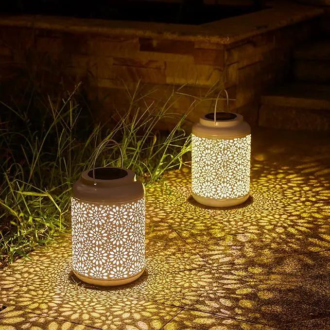 Glitzhome Solar Lantern White Metal Cutout Flower Outdoor Hanging Solar Light with Handle for Garden Patio Yard Outdoor Decor by GreenHaven Gardens