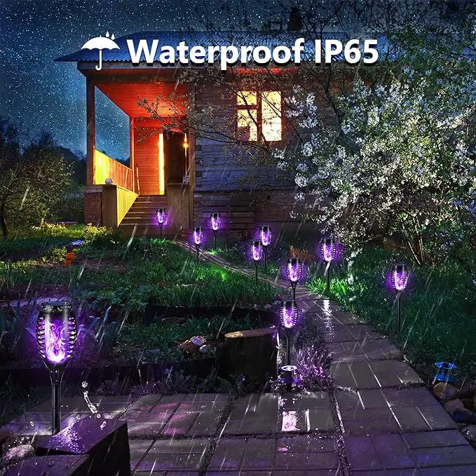 Toodour Solar Torch Flame Lights, 12 Pack Outdoor Flickering Flame Waterproof Pathway Lights Landscape Decoration for Garden, Lawn, Yard - Purple by GreenHaven Gardens