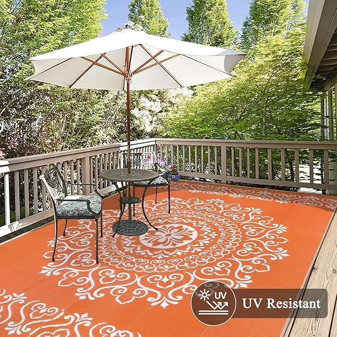 Pauwer Waterproof Outdoor Rug 6x9, Reversible Plastic Straw Patio Camping Rug, Indoor Outdoor RV Mat Carpet for Deck, Camper, Porch, Balcony, Backyard, Picnic, Floral Orange