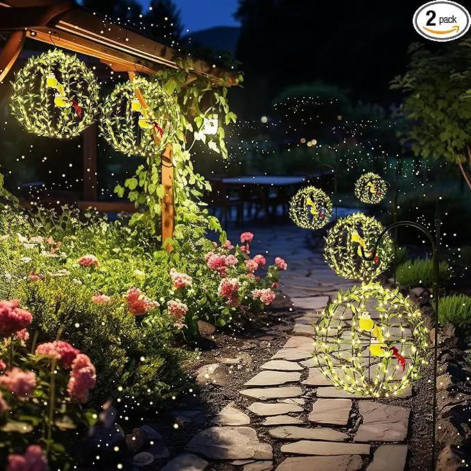 Joomer Solar Lights Outdoor, 2 Pack 12in 120 LED Solar Hanging Light Balls Outdoor, 8 Modes Waterproof Foldable Metal Sphere Light with Hook for Outside Hanging - Warm White(Ball with Green Leaf+Bird)