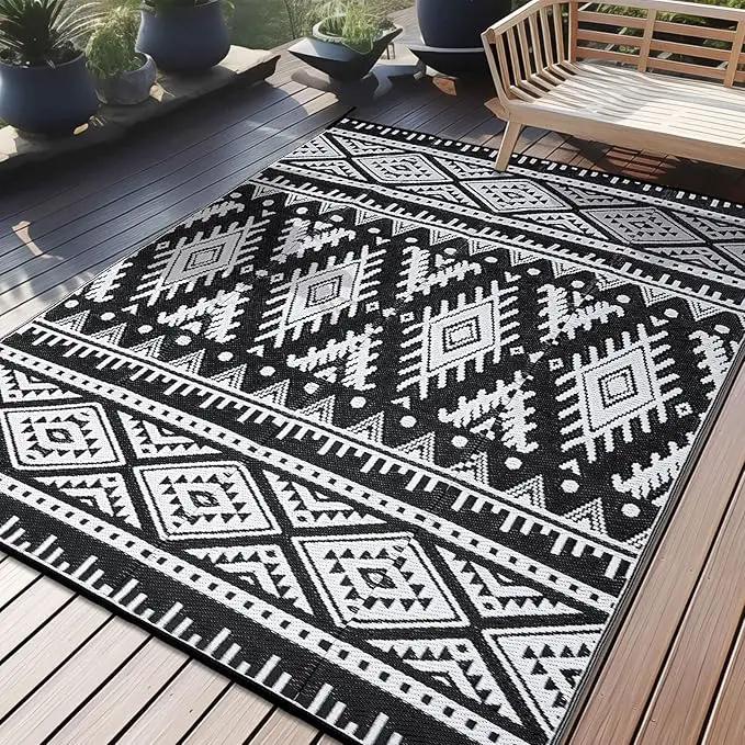 OLANLY Outdoor Rug Waterproof 10x14 ft, Reversible Outdoor Plastic Straw Rug, Boho Patio Rug, Indoor Outdoor Carpet, RV Mat Outside for Patio, Camp, Picnic, Balcony, Deck, Backyard, Black & White by GreenHaven Gardens