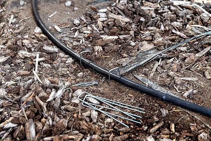 Squirrel Products U Shape Garden Stakes Metal, 6 Inch Landscaping Staples, 11 Gauge Stakes for Landscaping Fabric, 2.9mm 15x2.5x15cm – 100 Pack by GreenHaven Gardens