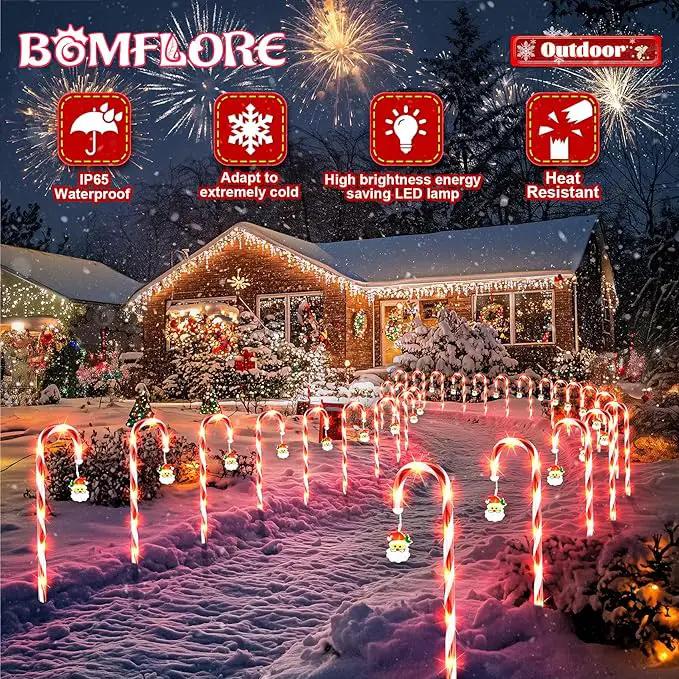 Solar Christmas Lights Outdoor Decorations: Candy Cane Light Waterproof for Yard Decorative Outside - Santa Claus Pathway Stake Lighting Patio Garden Path Street Decor 12 Pack by GreenHaven Gardens