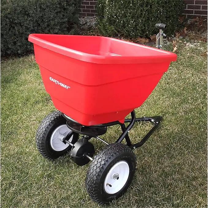 EarthWay Products T150 150lb Towable Broadcast Fertilizer Spreader, Seed Spreader, Pull Behind Aerator/Seeder for Garden Tractor, Easy Flow Control, Adjustable, Non-Skid Tires by GreenHaven Gardens