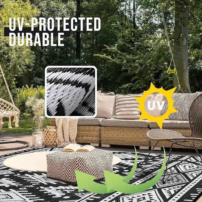 OLANLY Outdoor Rug Waterproof 10x14 ft, Reversible Outdoor Plastic Straw Rug, Boho Patio Rug, Indoor Outdoor Carpet, RV Mat Outside for Patio, Camp, Picnic, Balcony, Deck, Backyard, Black & White by GreenHaven Gardens