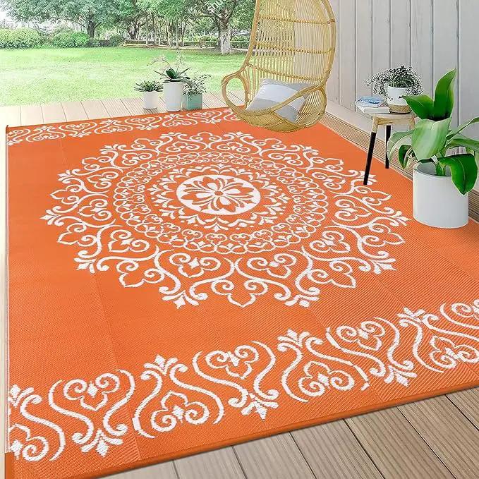 Pauwer Waterproof Outdoor Rug 6x9, Reversible Plastic Straw Patio Camping Rug, Indoor Outdoor RV Mat Carpet for Deck, Camper, Porch, Balcony, Backyard, Picnic, Floral Orange
