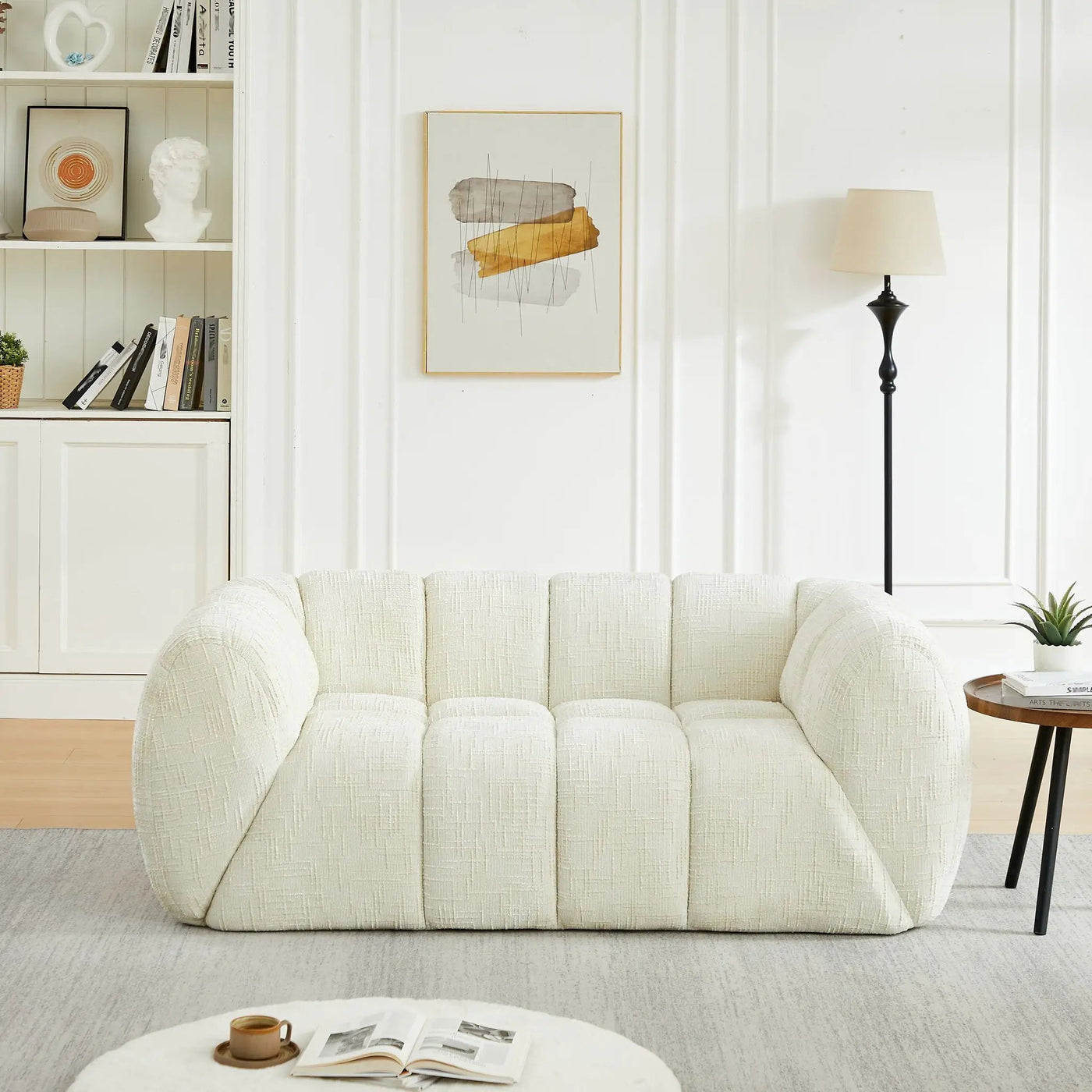 Quilted Cloud Sofa With Rounded Armrests And Piano Key Backrest Design by HouseOfZazla