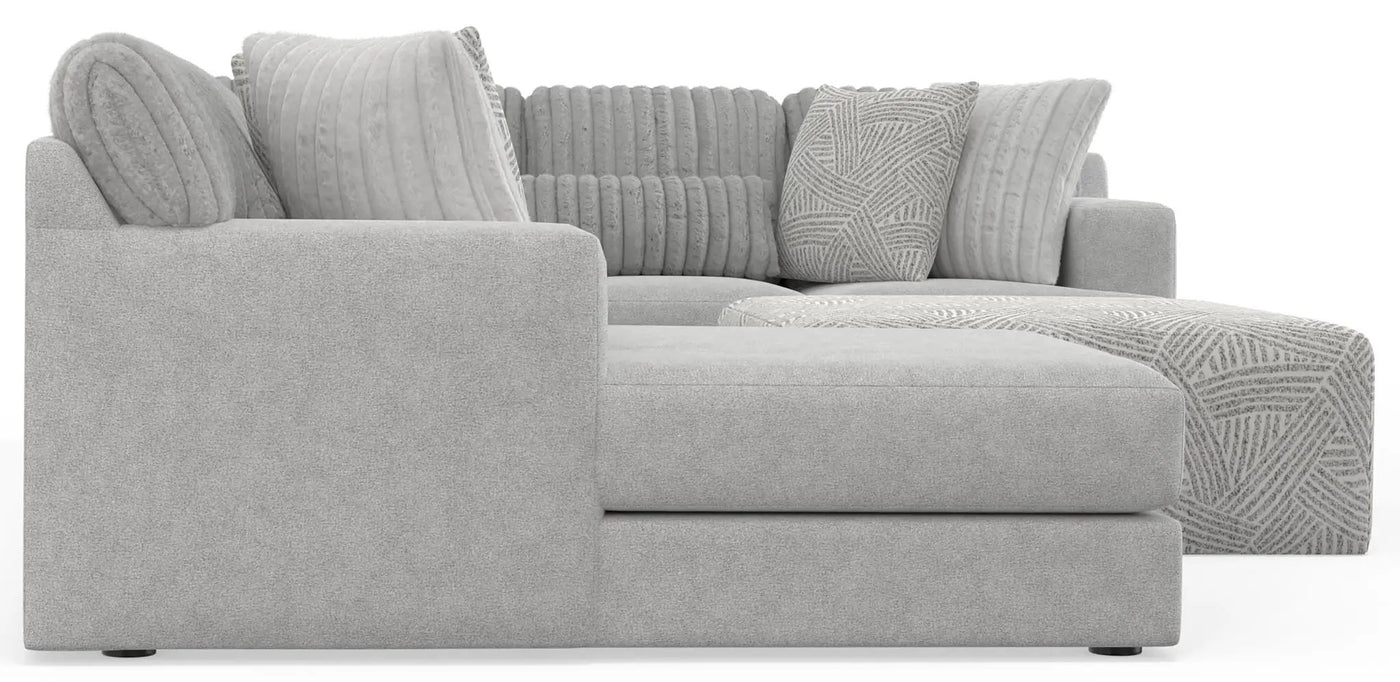 Logan - Upholstered Sectional With Comfort Coil Seating - 46" Cocktail Ottoman And Accent Pillows Included by Unique Piece Furniture