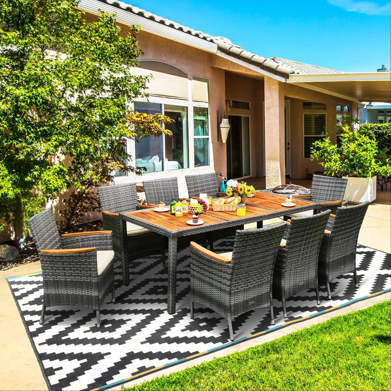 9 Pieces Rattan Patio Dining Set with Acacia Wood Table and Cushioned Chair by DirectDeals