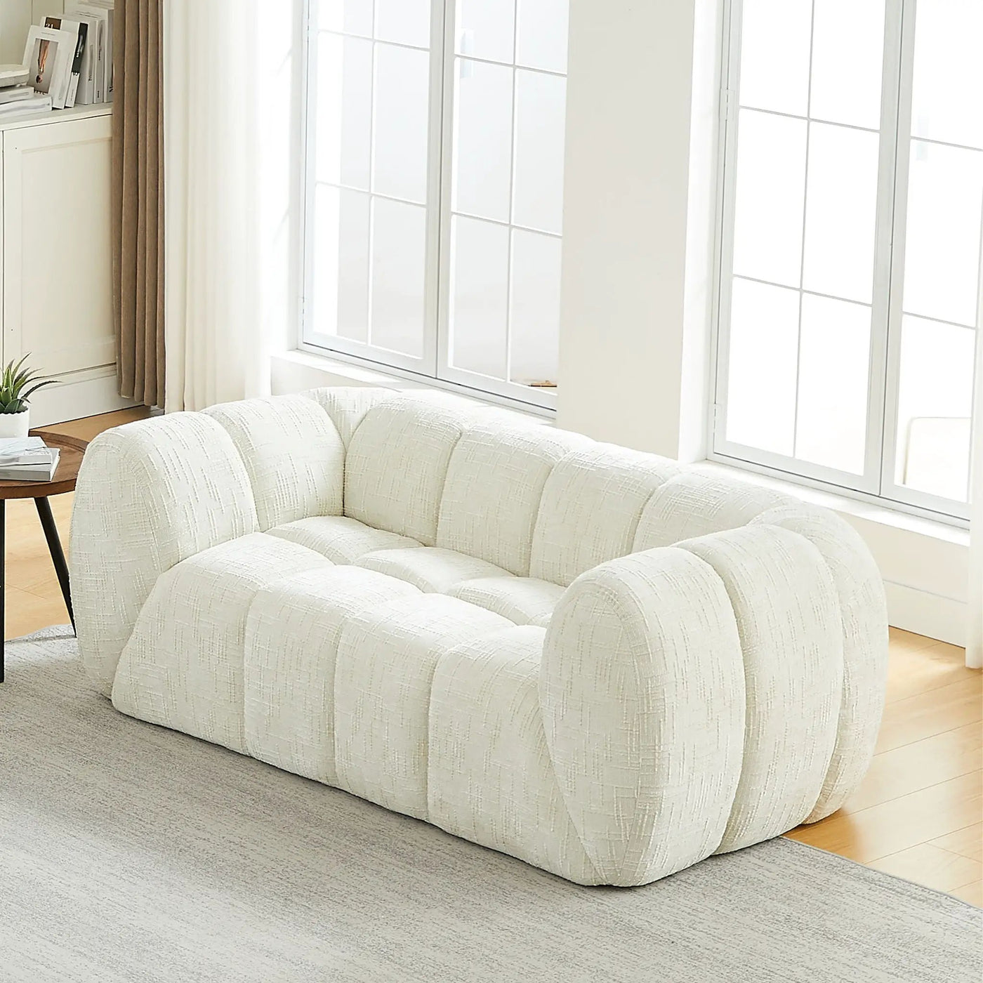 Quilted Cloud Sofa With Rounded Armrests And Piano Key Backrest Design by HouseOfZazla