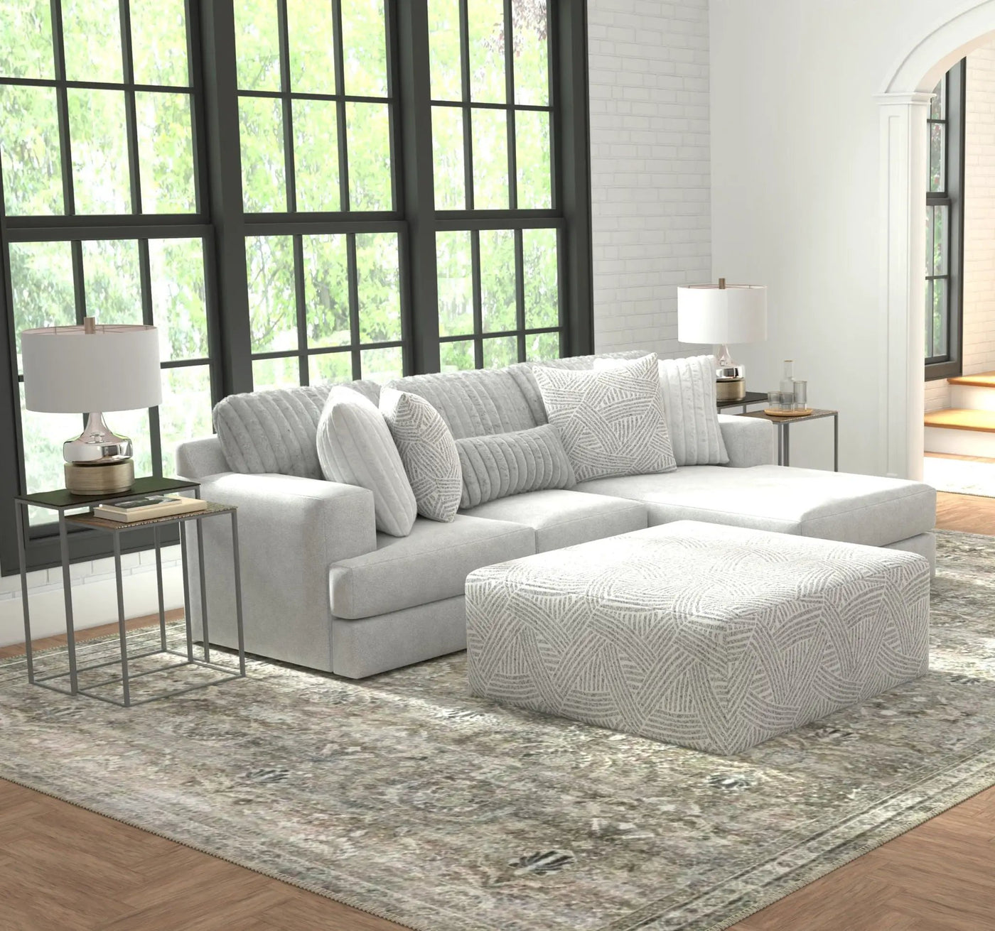 Logan - Upholstered Sectional With Comfort Coil Seating - 46" Cocktail Ottoman And Accent Pillows Included by Unique Piece Furniture