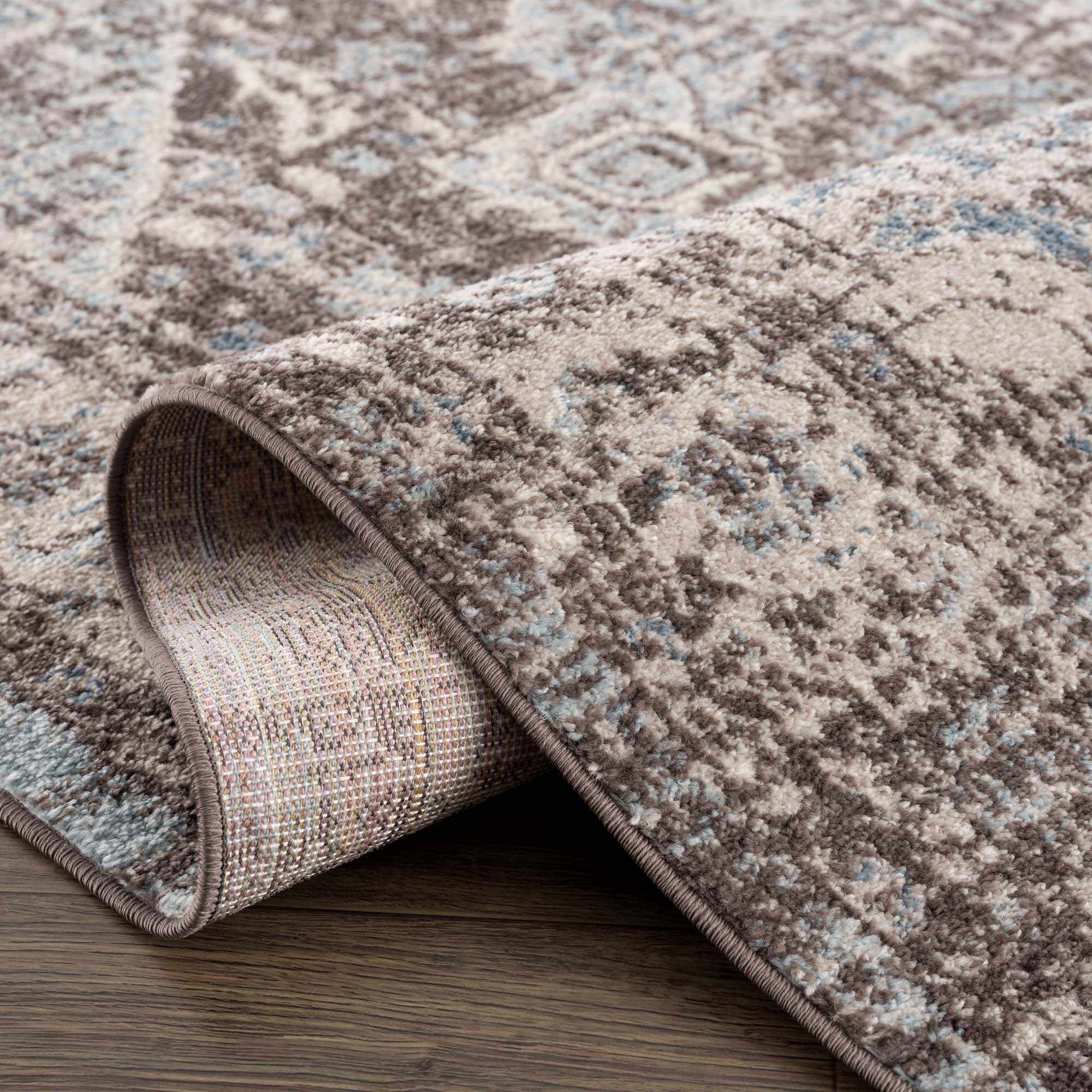 Peeta Dark Brown Medallion Area Rug by Hauteloom