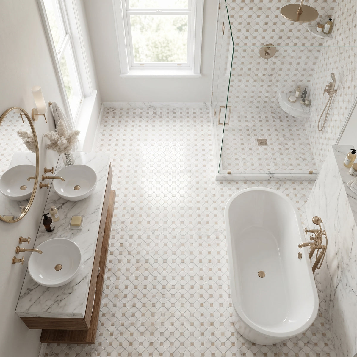 A bright, modern bathroom featuring a white freestanding bathtub, a double-sink vanity with marble tops and gold fixtures, a glass shower enclosure, and a white-and-beige patterned tile floor.