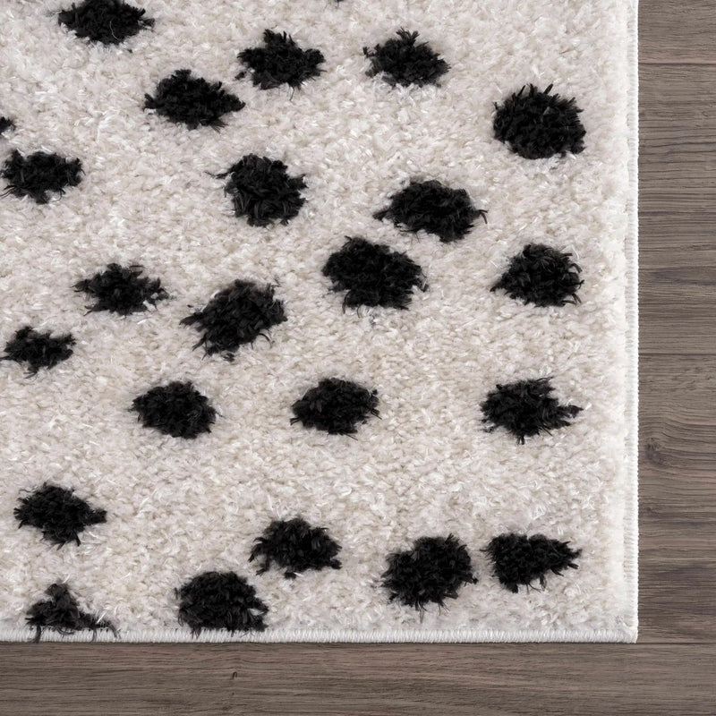 Cansu Black & White Dotted Area Rug by Hauteloom