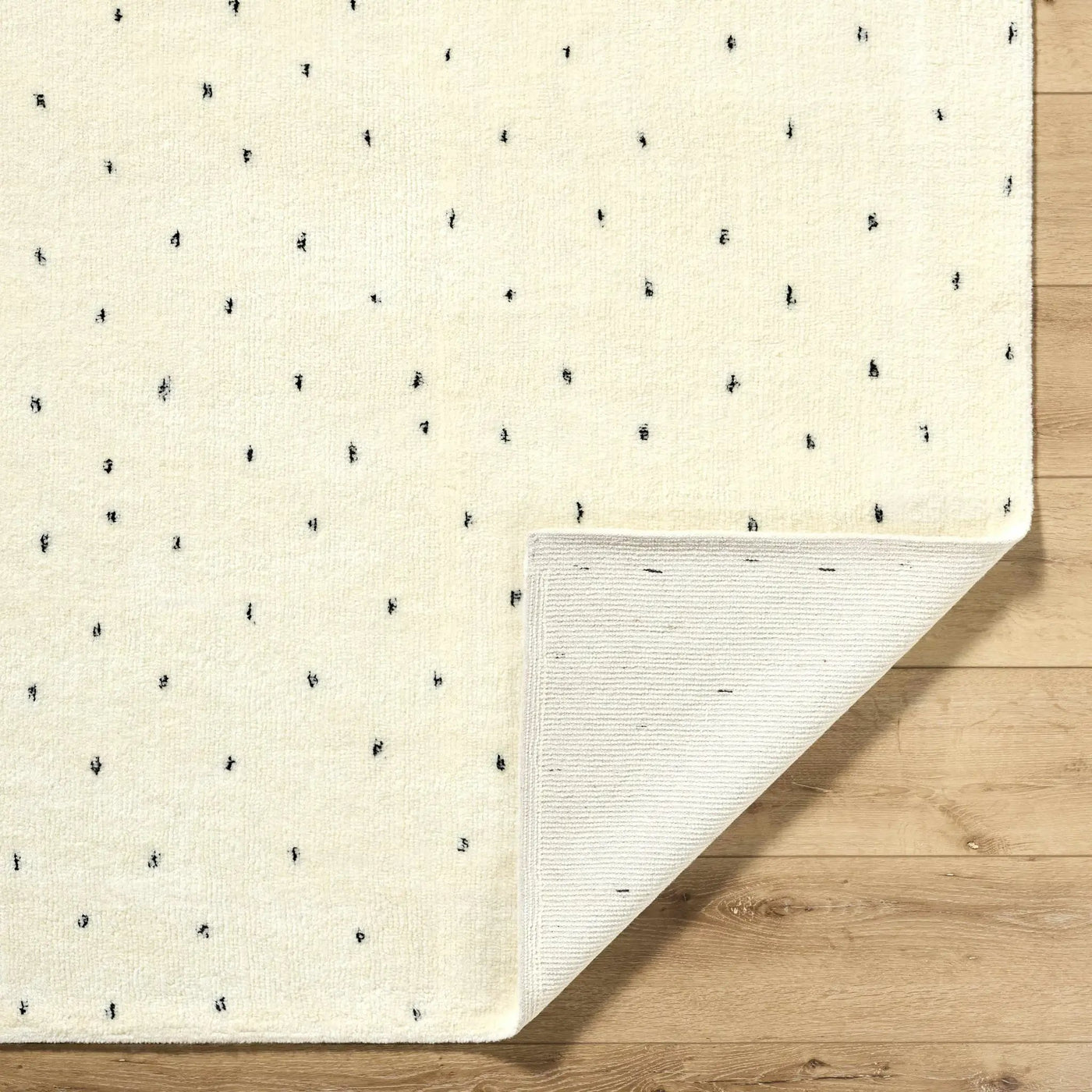Cirila Dotted Ivory Washable Wool Rug by Boutique Rugs