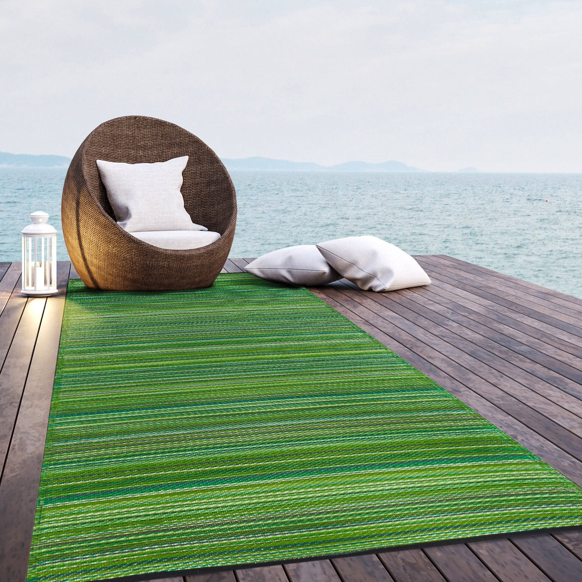 Cancun - Green Outdoor Rug for Patio, installed in a room