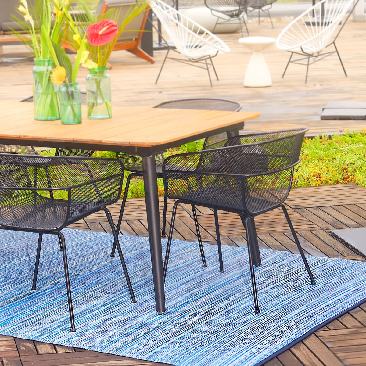 Cancun - Indigo Outdoor Rug for Patio, installed in a room