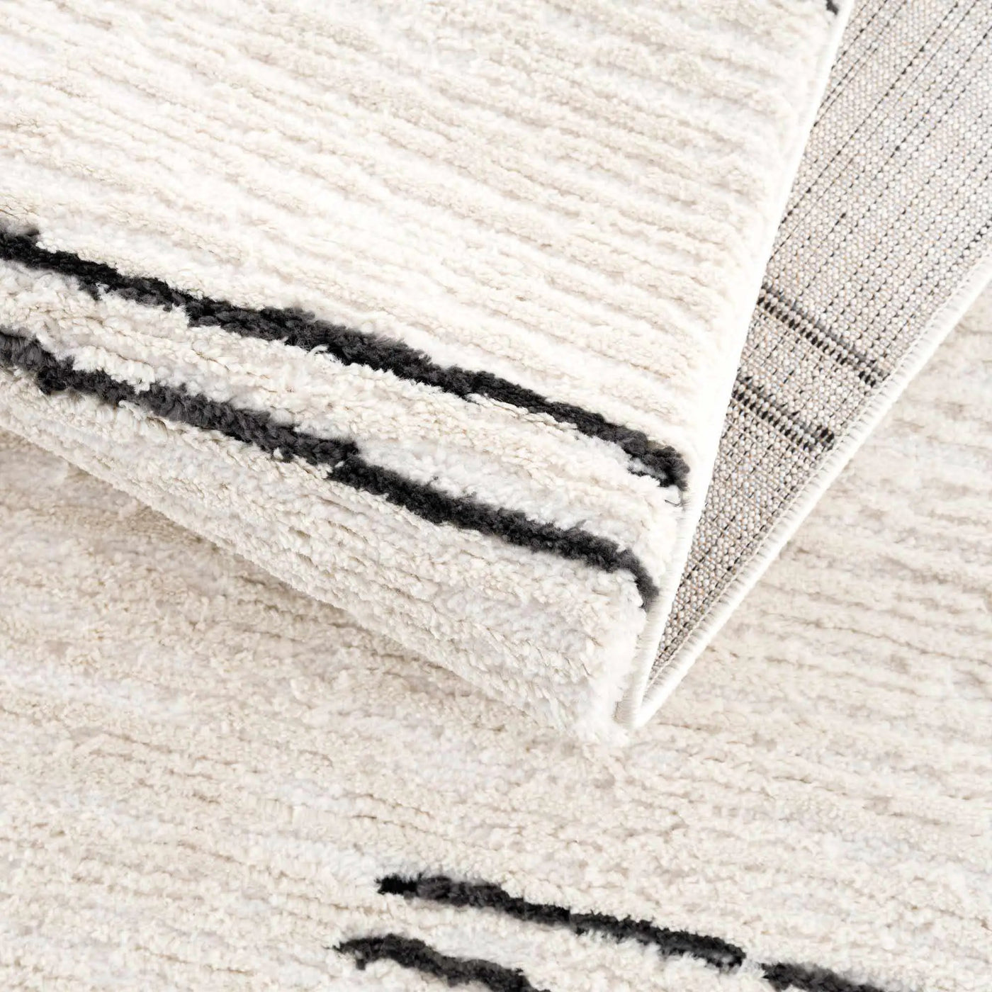 Riad Black Striped White Rug with Tassels by Boutique Rugs