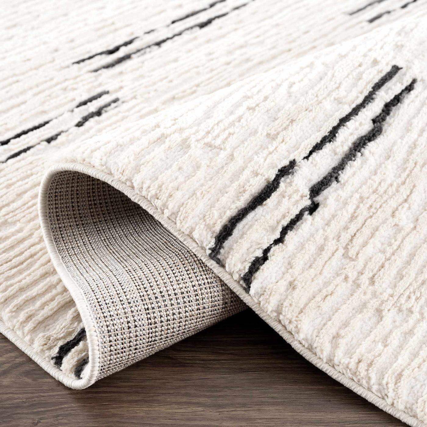Riad Black Striped White Rug with Tassels by Boutique Rugs