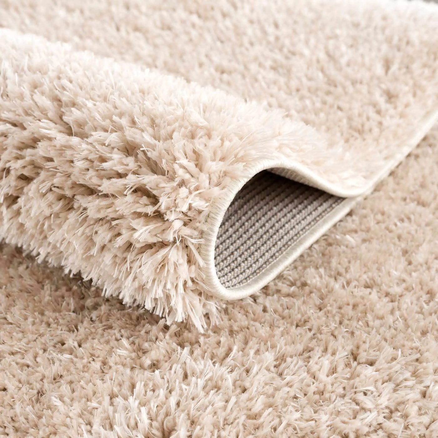 Faina Solid Beige Shag Rug Washable by Hauteloom