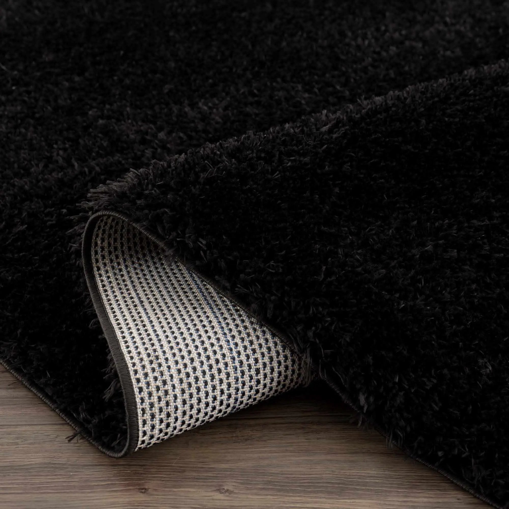 Faina Solid Black Shag Washable Area Rug - Clearance by Boutique Rugs