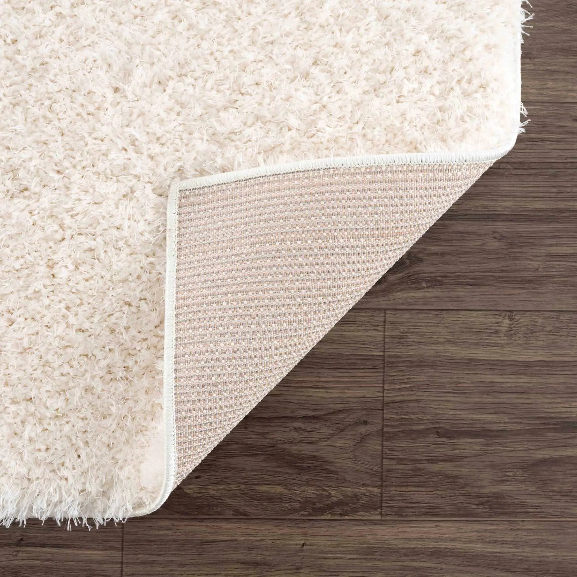Faina Solid Cream Shag Washable Area Rug - Clearance by Boutique Rugs