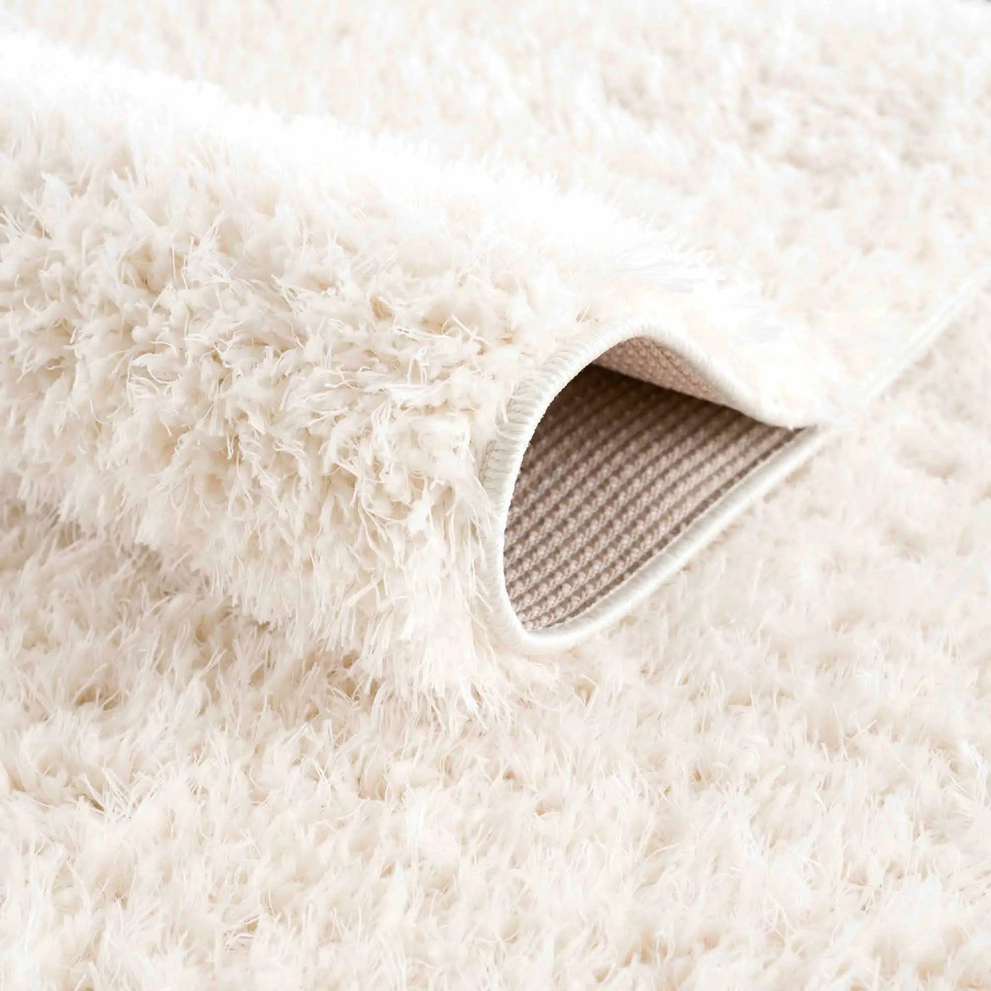 Faina Solid Cream Shag Washable Area Rug - Clearance by Boutique Rugs