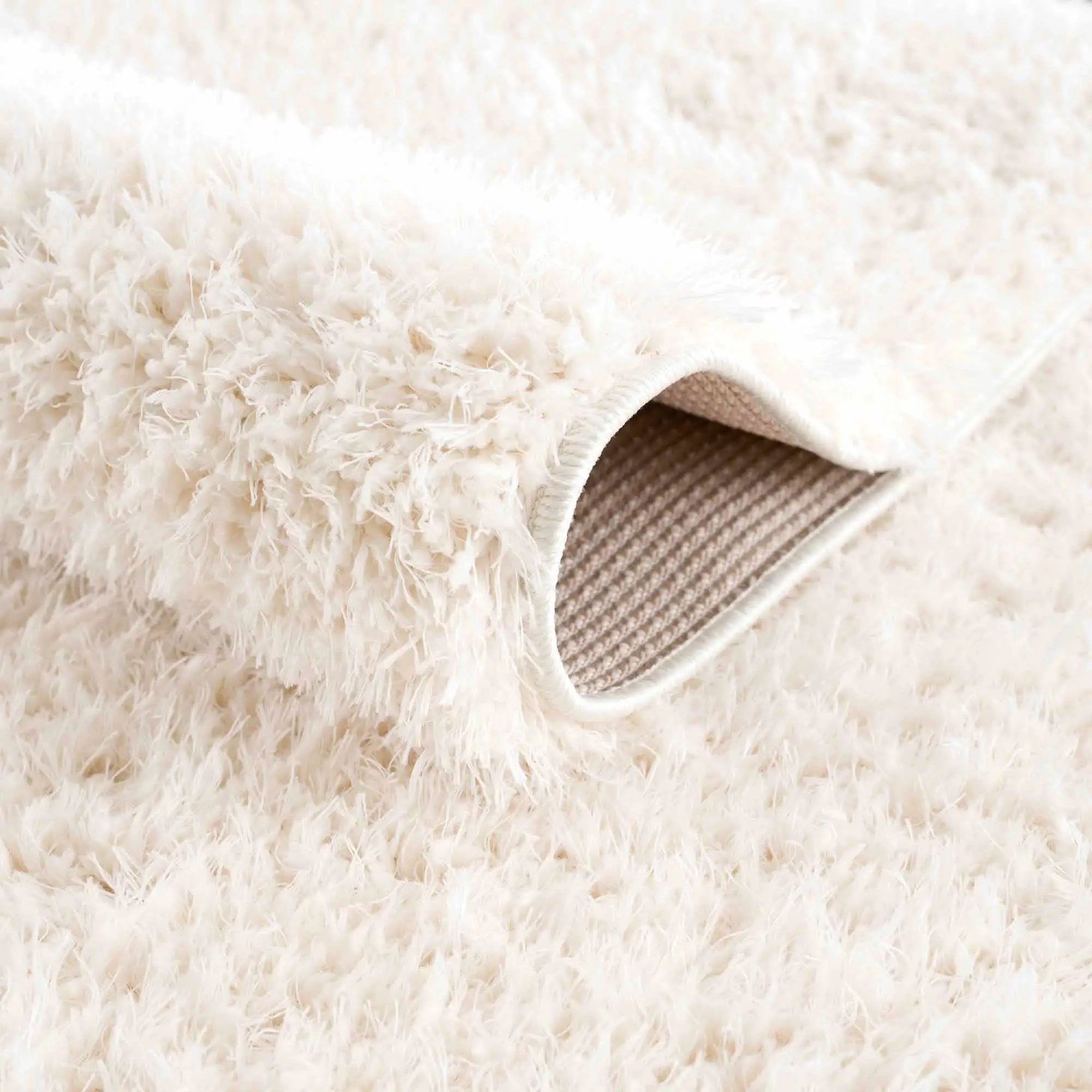 Faina Solid Cream Shag Washable Area Rug - Clearance by Boutique Rugs