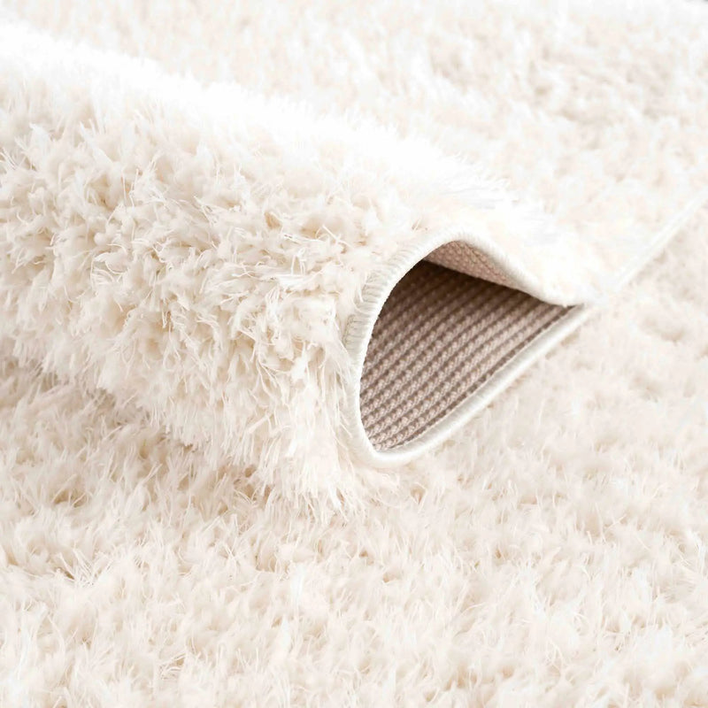 Faina Solid Cream Shag Washable Area Rug - Clearance by Boutique Rugs