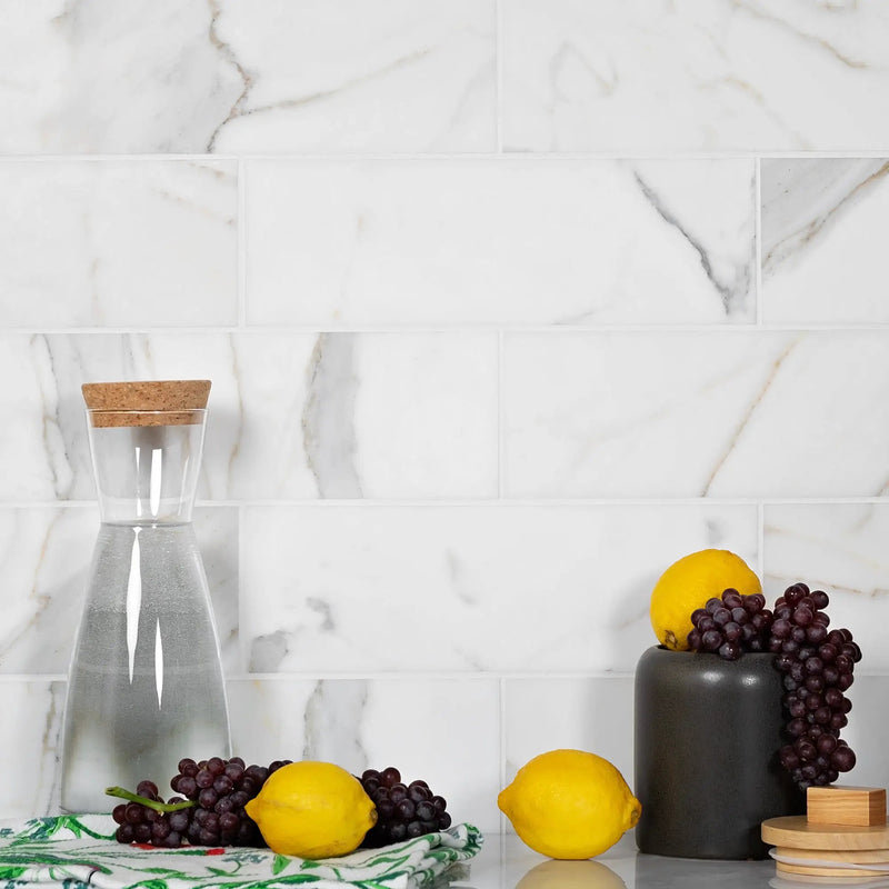 White 4x12 Honed Subway Calacatta Gold Marble Tile (15 pack, 5 sq ft/case) by Apollo Tile