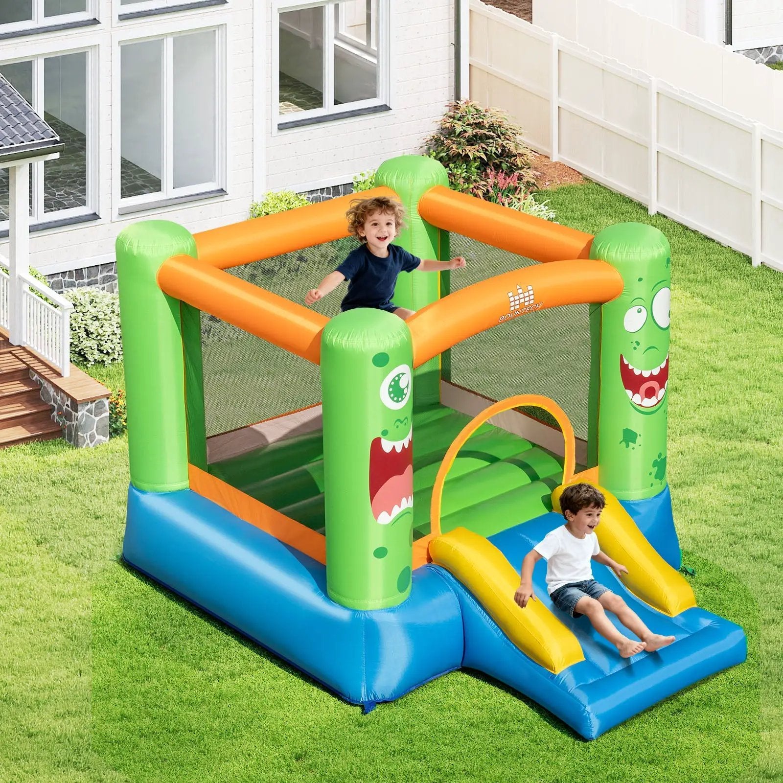 Inflatable Bounce House Monster Themed Bouncy Castle with Large Jumping Area and Slide 550W Blower Included by DirectDeals