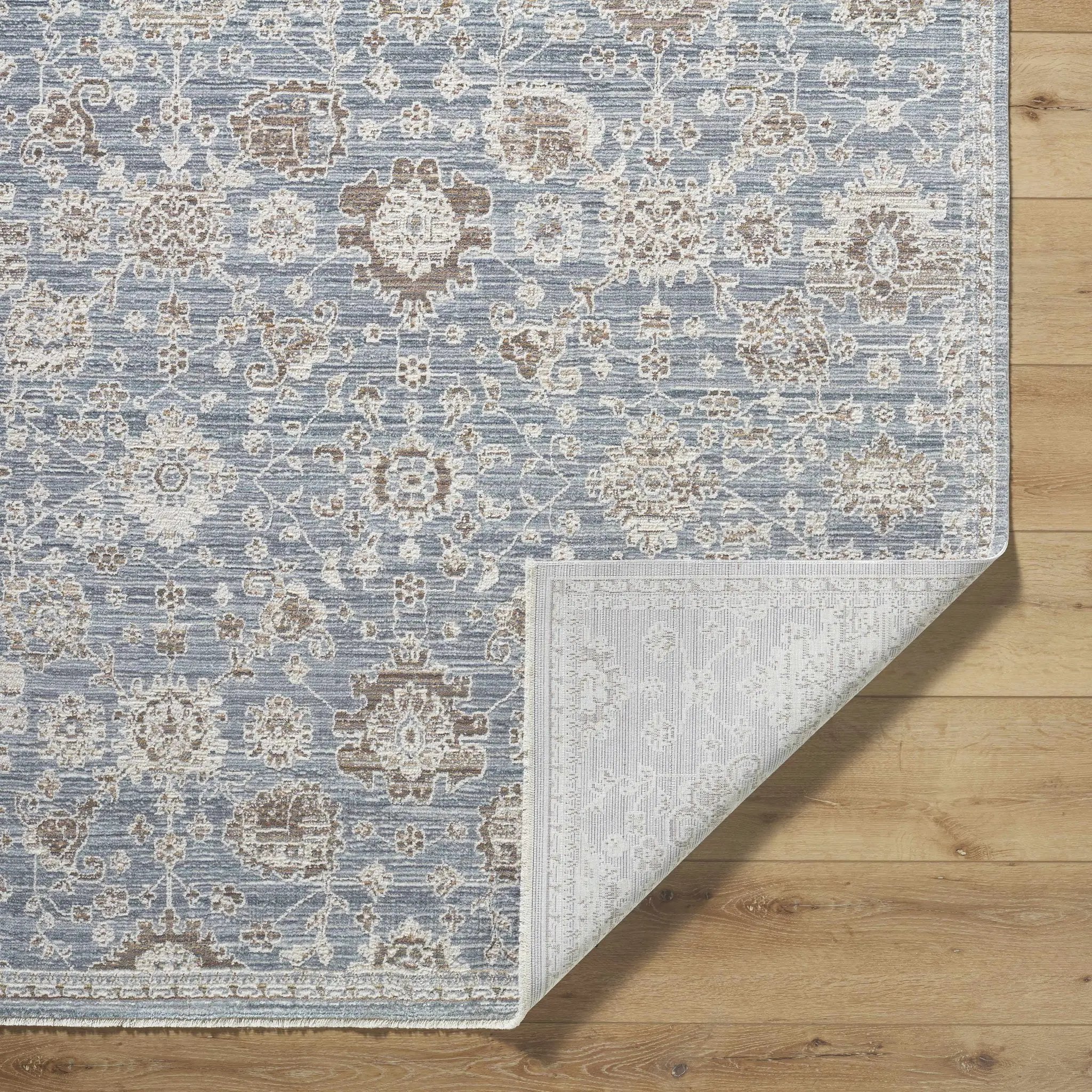 Urara Blue Area Rug by Boutique Rugs