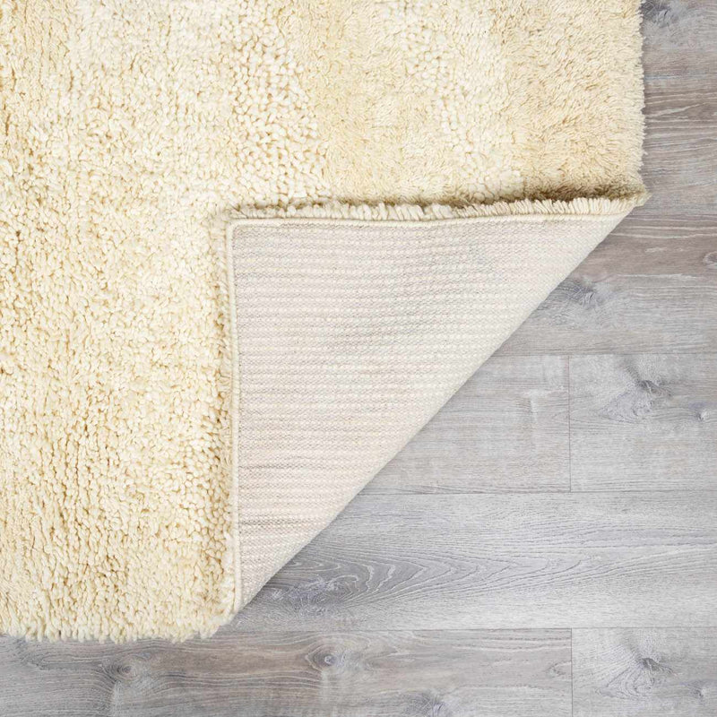 Kettering Solid Cream Wool Shag Rug by Boutique Rugs