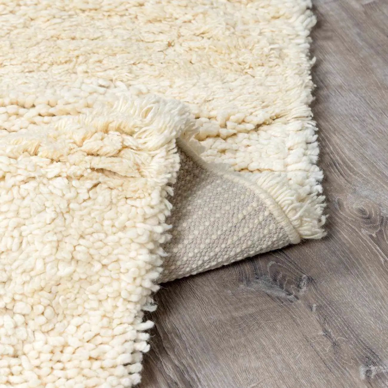 Kettering Solid Cream Wool Shag Rug by Boutique Rugs