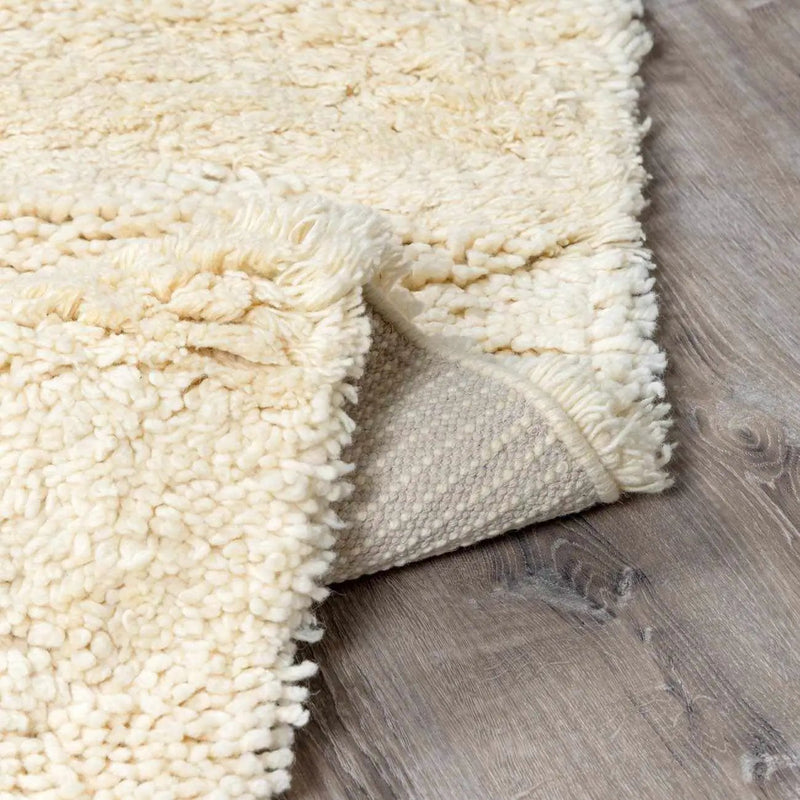 Kettering Solid Cream Wool Shag Rug by Boutique Rugs