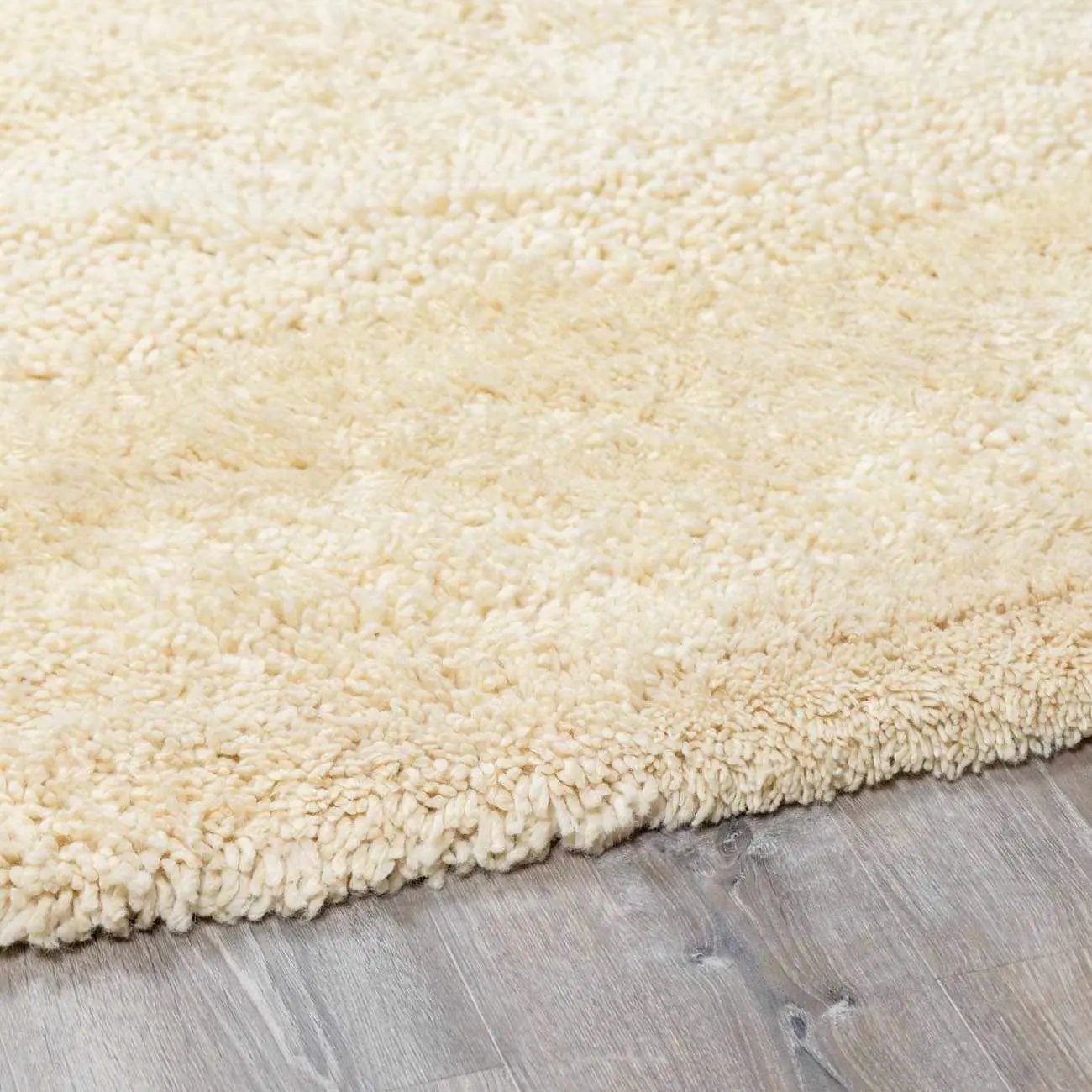 Kettering Solid Cream Wool Shag Rug by Boutique Rugs