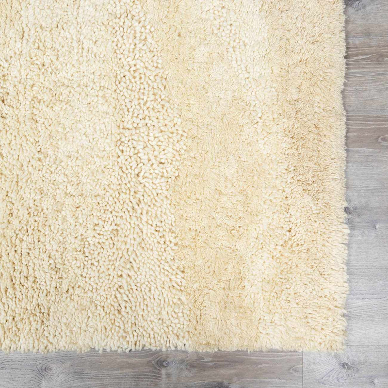 Kettering Solid Cream Wool Shag Rug by Boutique Rugs
