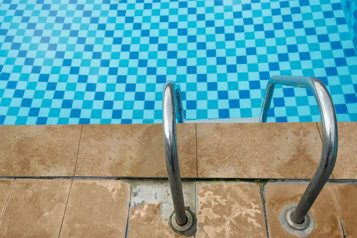 Tuscany Walnut Travertine Pool Copings 12x24 in a finished room