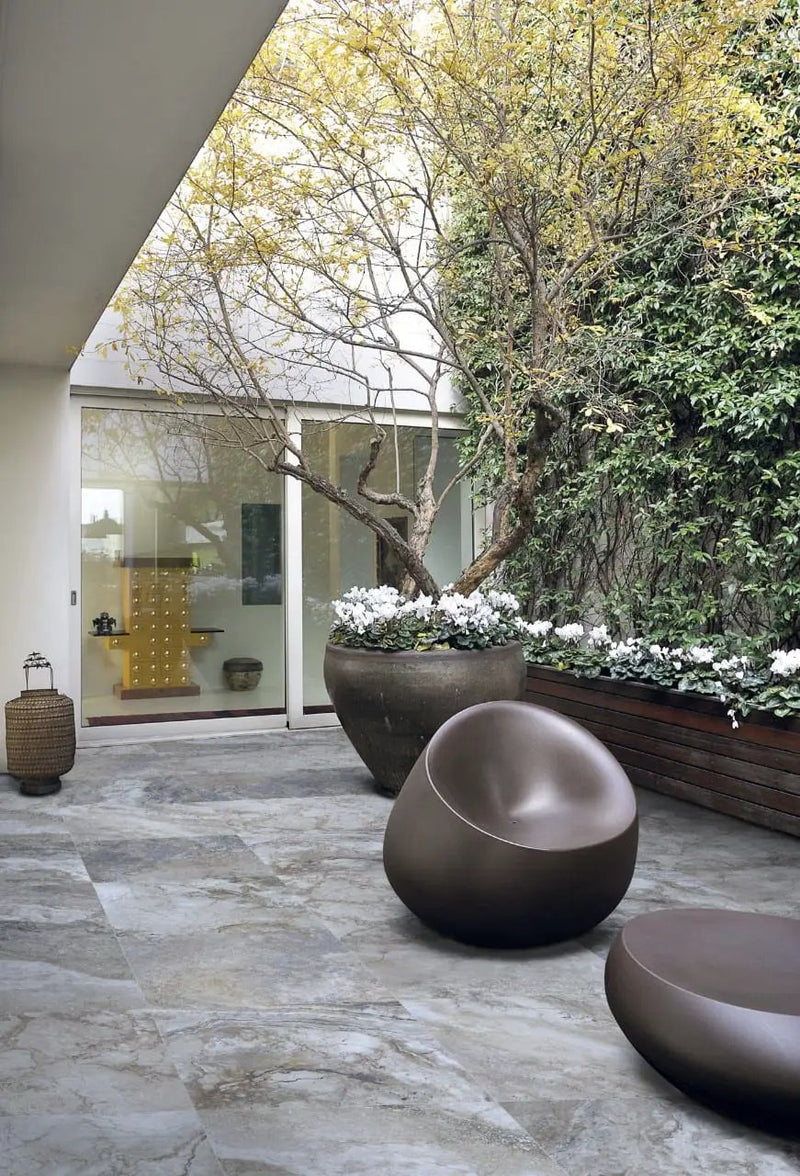 Argento Travertino Matte Porcelain Pavers 24x24 in a finished room