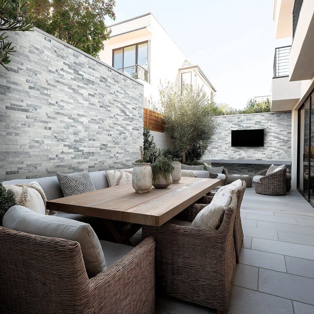 Alaska Gray Split Face Corner Marble Pavers 6x12 in a finished room