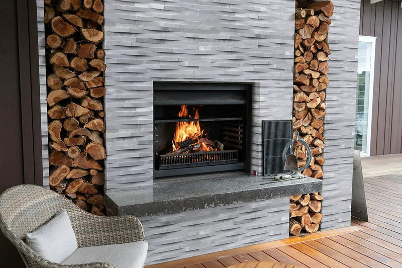 Cosmic Gray 3d Wave Split Face Marble Pavers 6x18 in a finished room