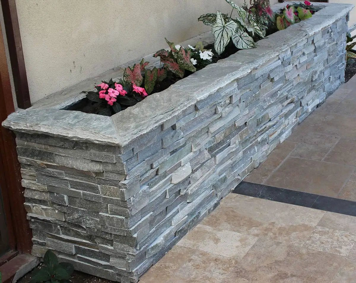 Sierra Blue Split Face Corner Quartzite Pavers 6x12 in a finished room