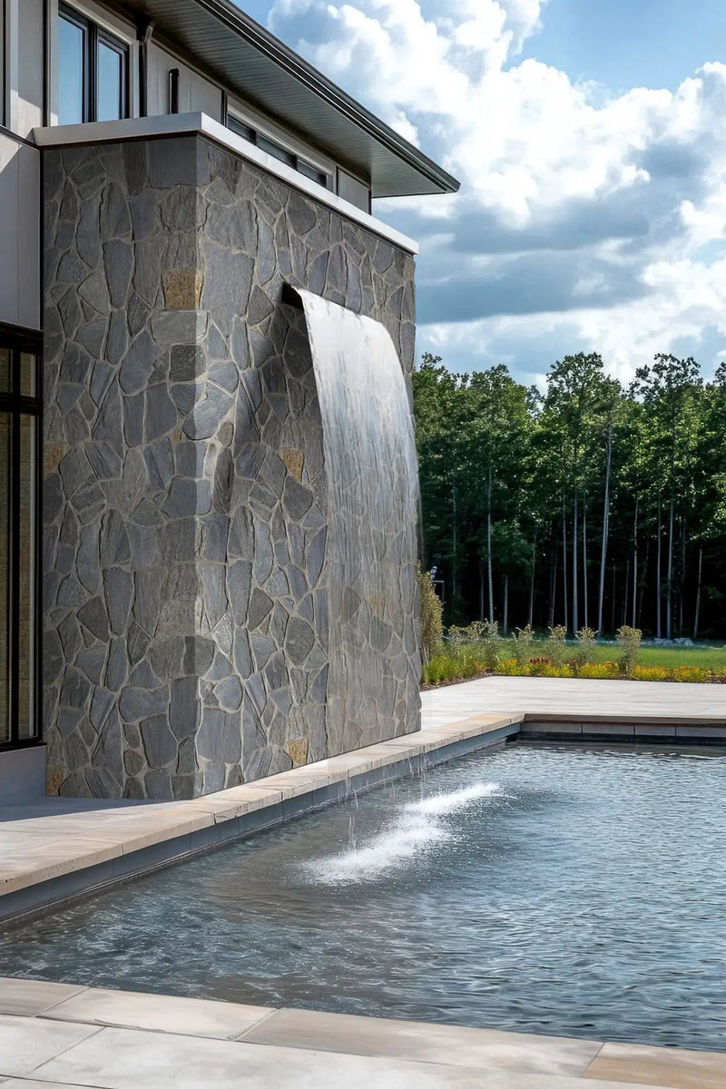 Avalon Bay Fieldstone Split Face Marble Pavers in a finished room