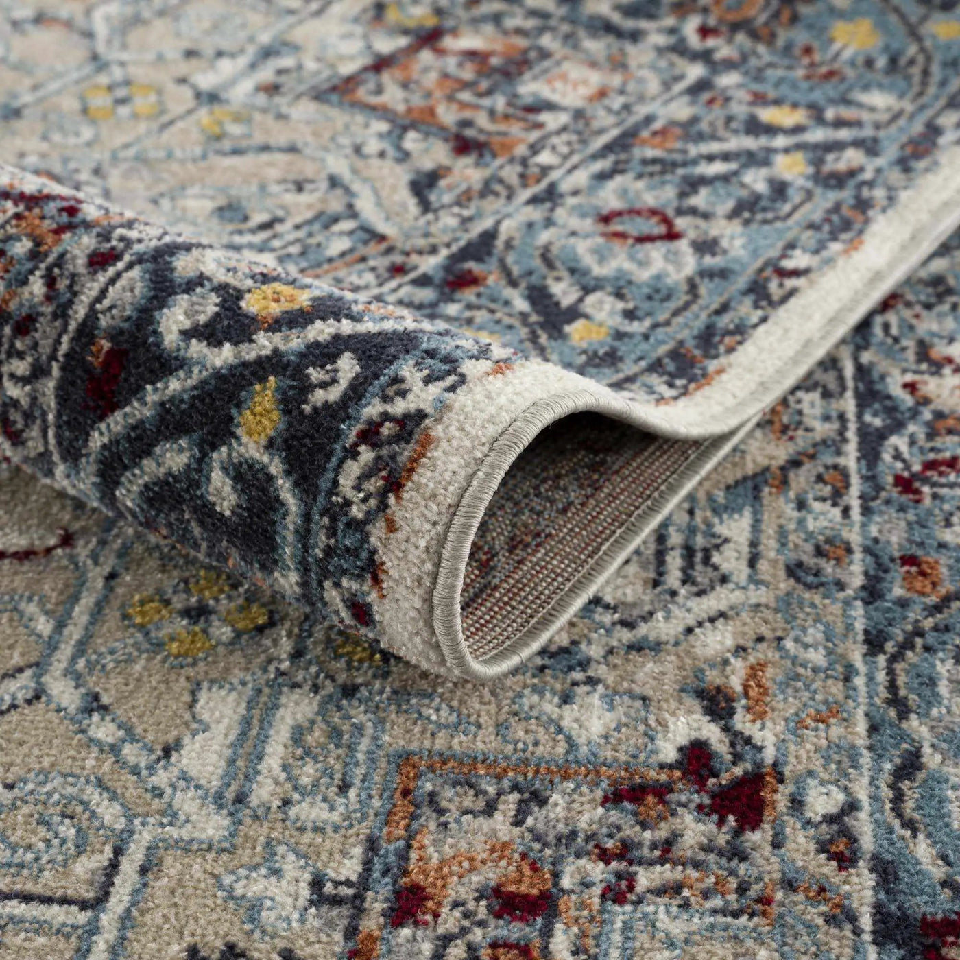 Cabacungan Blue & Rust Washable Area Rug - Clearance by Boutique Rugs