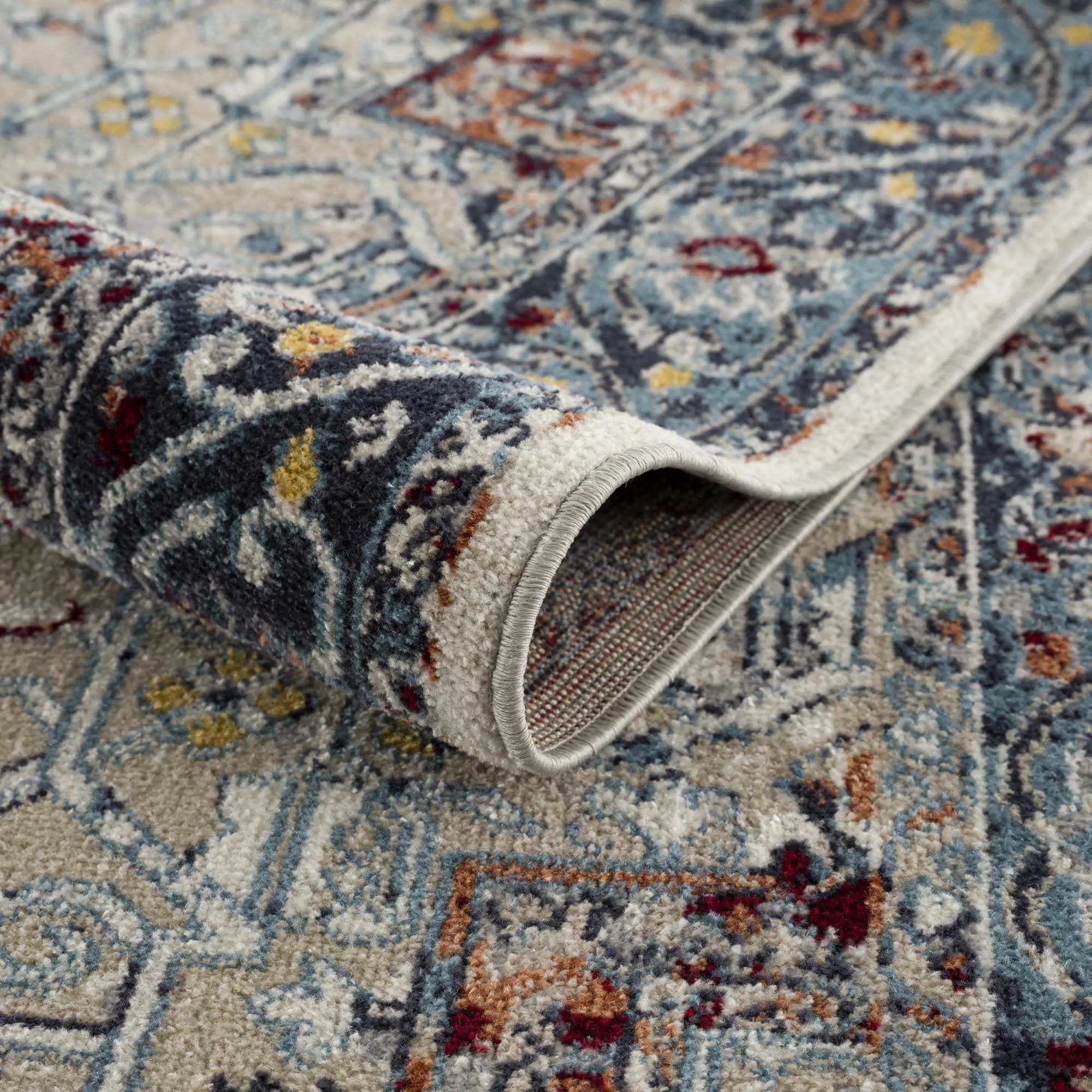 Cabacungan Blue & Rust Washable Area Rug - Clearance by Boutique Rugs