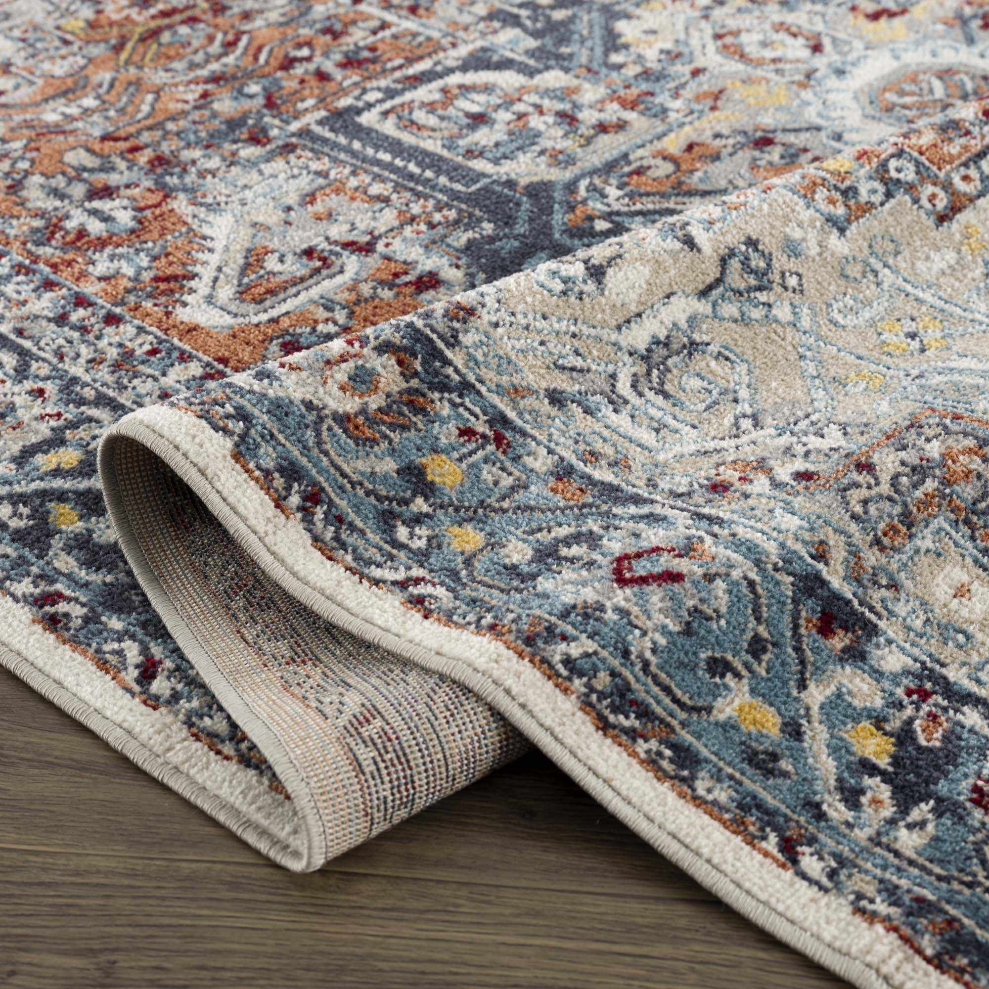 Cabacungan Blue & Rust Washable Area Rug - Clearance by Boutique Rugs